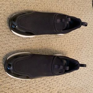 Ferragamo sneakers. About 1 inch height.